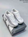 Pair of white and grey Adidas HYPERBOOST EDGE W sneakers displayed on an Adidas shoe box.