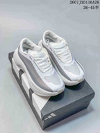 Pair of white and grey Adidas HYPERBOOST EDGE W sneakers displayed on an Adidas shoe box.