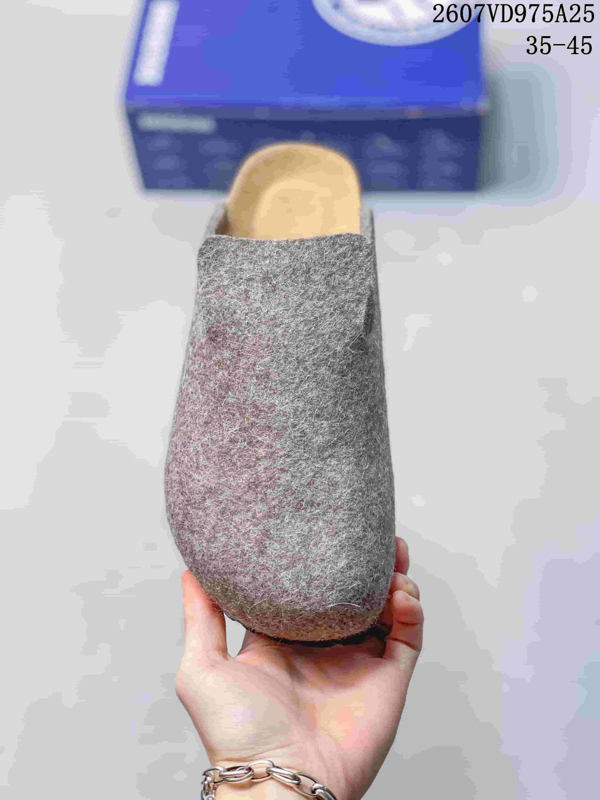 Top view of a single gray closed-toe clog with a rounded toe and visible contoured footbed.