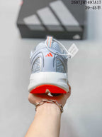 Rear view of the light gray running shoe showing the heel structure, orange outsole detail and Adidas logo.