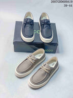 Navy and gray ECCO lace-up sneakers shown from above and beside the branded box; style code 2607GDD609A19 and size range 39–44 are visible.