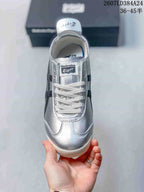 Top view showing the silver toe box, white laces and Onitsuka Tiger tongue label.