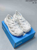 Pair of white HOKA Hopara OG outdoor sandals displayed on a blue shoe box.