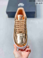 Top view showing the perforated toe box, tonal laces, lace hardware and padded collar.