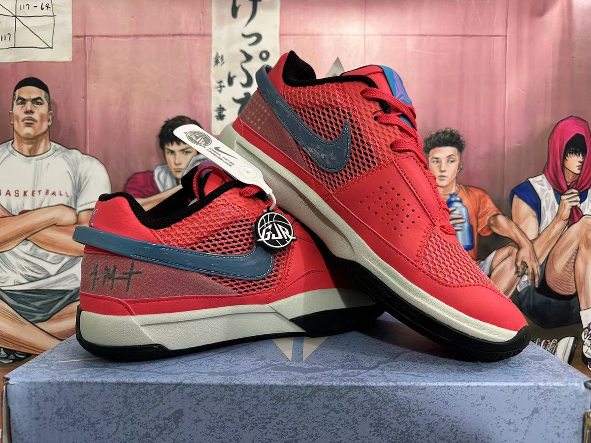 Two red Nike basketball shoes shown from the side, with mesh panels, dark swooshes, and contrasting soles.