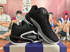 Two black Jordan basketball shoes displayed at an angle, showing the side panels and outsoles