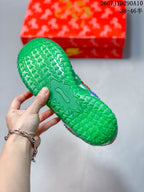Close-up of the green textured outsole of a Nike Ja 3 sneaker.