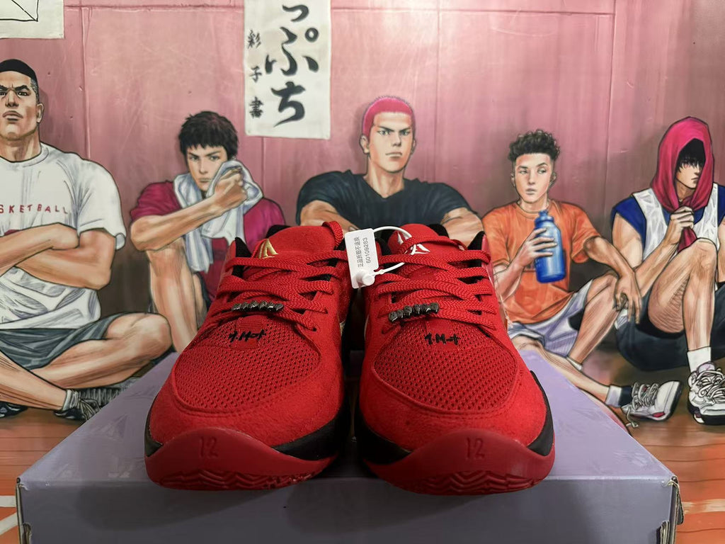 Front view of red Nike basketball shoes with red laces and black accents