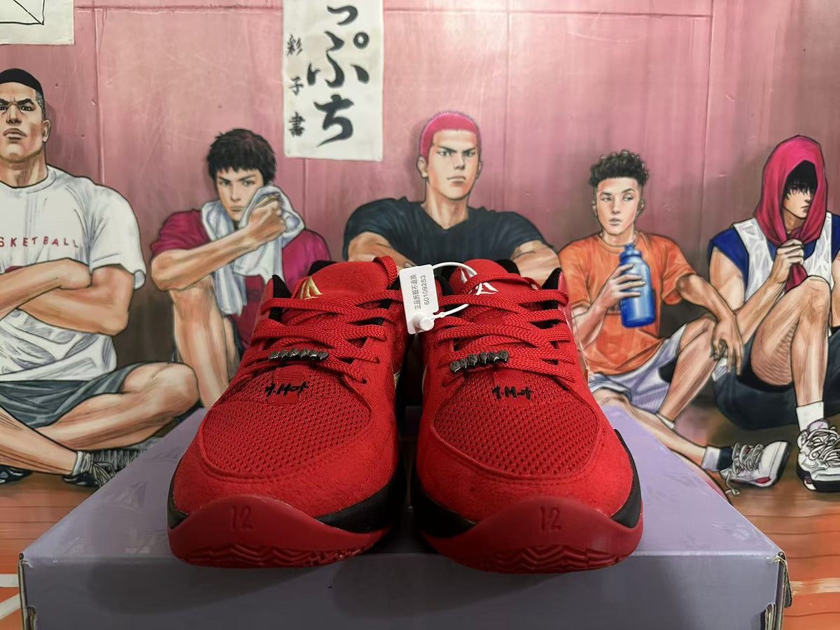 Front view of red Nike basketball shoes with red laces and black accents