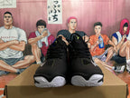 Front view of black Mizuno Wave Momentum 3 shoes with white outsoles.