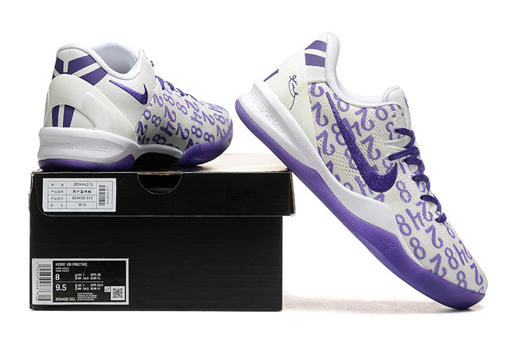 White and purple Kobe 8 Protro shoes displayed with a shoe box.