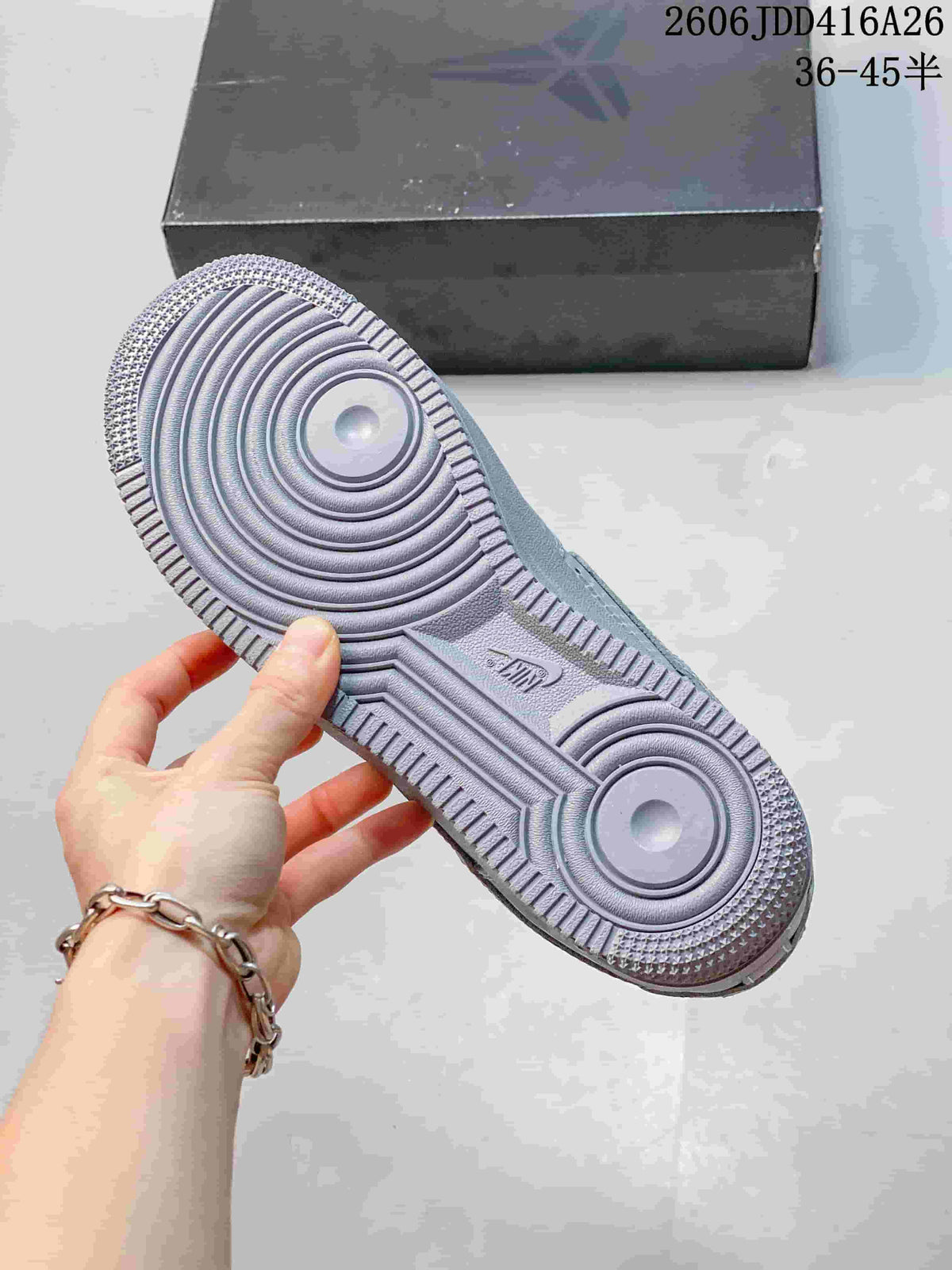 Close-up of the gray outsole with circular traction patterns