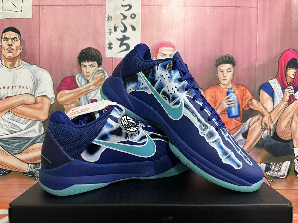 Pair of blue Nike basketball shoes shown at an angle
