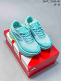 Aqua adidas Hyperboost ATR sneakers with lime accents, shown from above on a red-and-white shoe box.