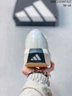 Rear view of the white sneaker showing the adidas logo on a dark heel panel.