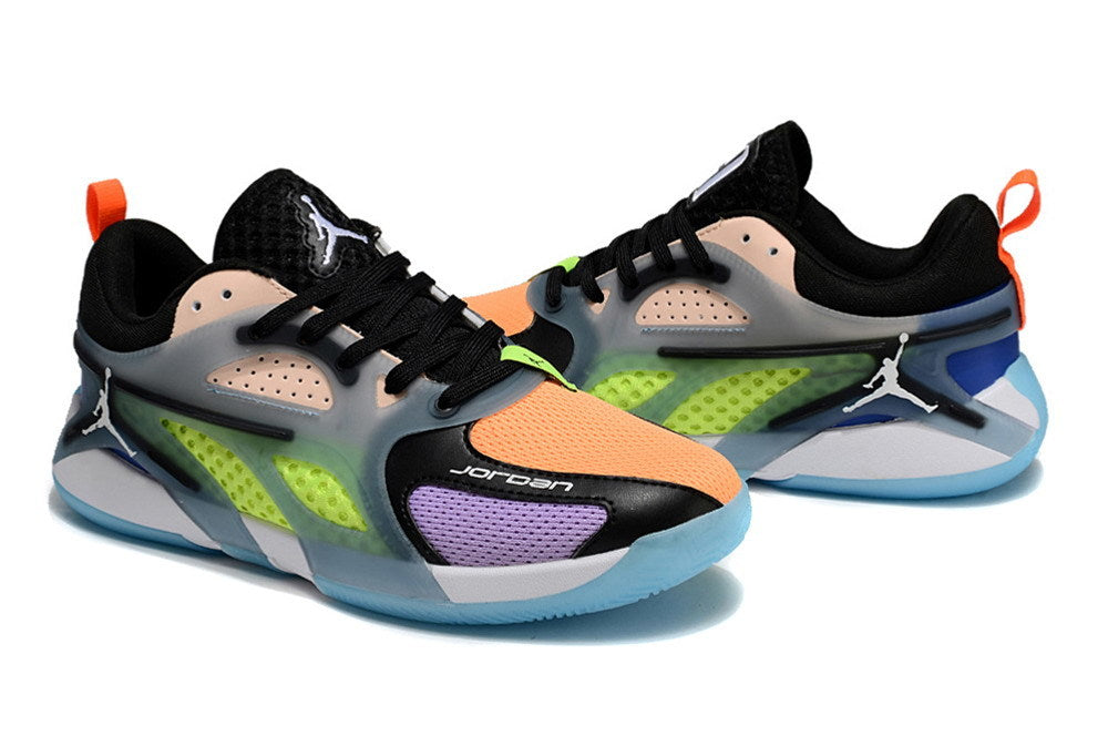 Side view of multicolor Jordan Heir shoes with lime side panels and blue outsoles