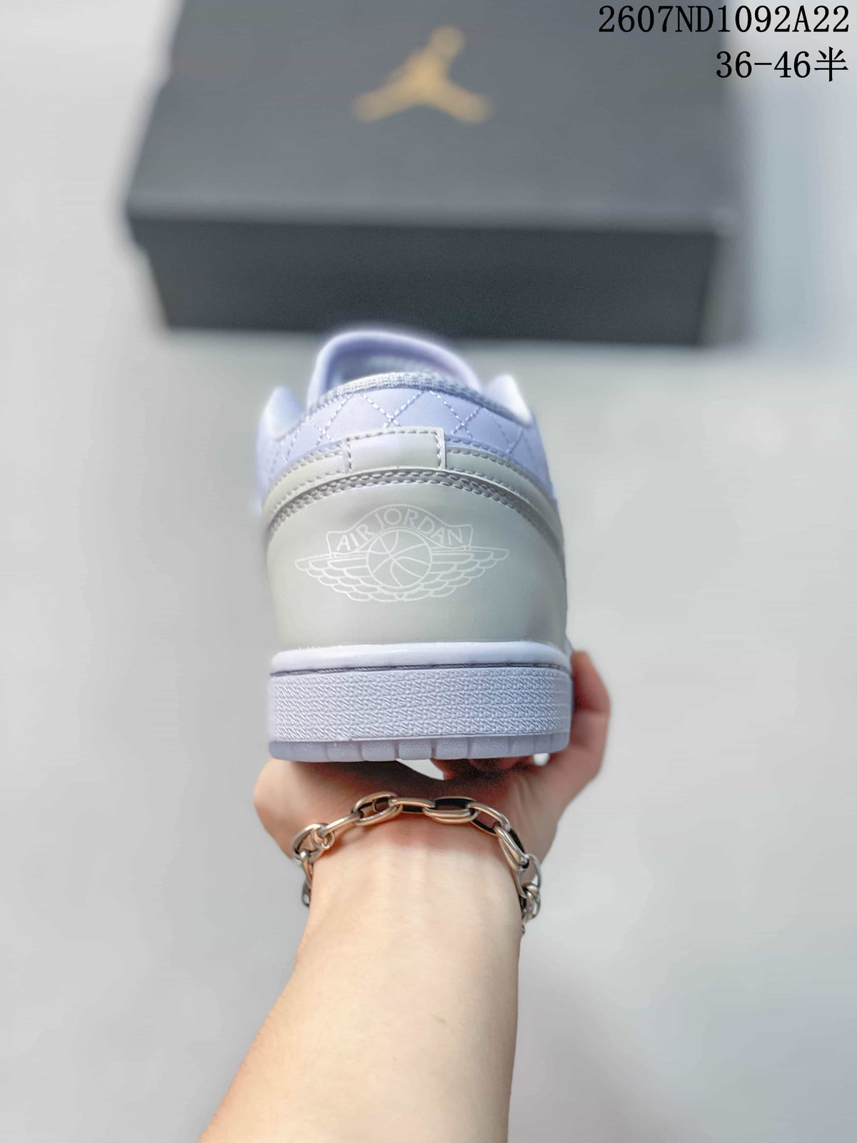 Rear view of the sneaker showing the Air Jordan wings emblem on the heel.