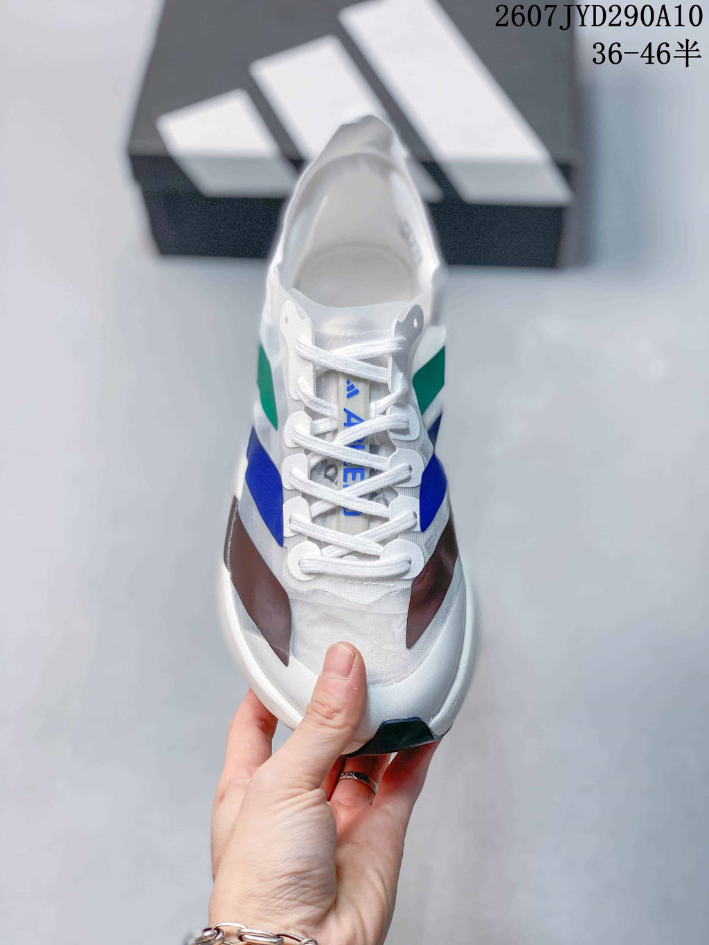 Top view showing the white laces, tongue branding and contrasting side panels.