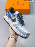 Close view of a blue-and-white patterned sneaker with dark side detailing