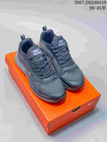 Pair of dark Nike running shoes displayed on an orange shoebox, with overlay text showing code 2607JDD246A16 and size range 39–45 half sizes.