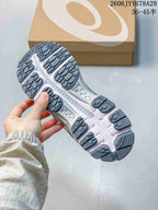 Close-up of the shoe outsole showing segmented tread and a sculpted sole.