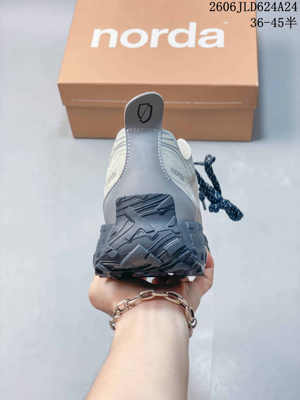 Rear view showing the heel pull tab and rugged outsole.