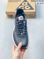 Top view showing the lace-up layout, dark gray upper, padded collar, and Nike tongue label.