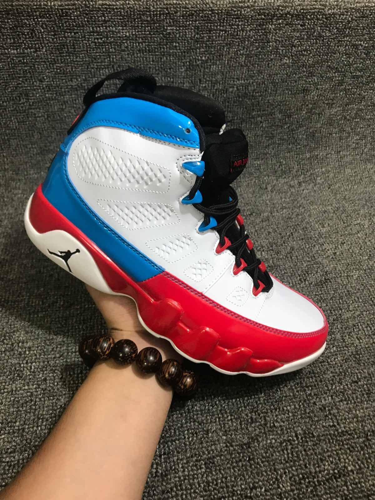 Jordan 9 Retro White, Red and Blue High-Top Sneakers