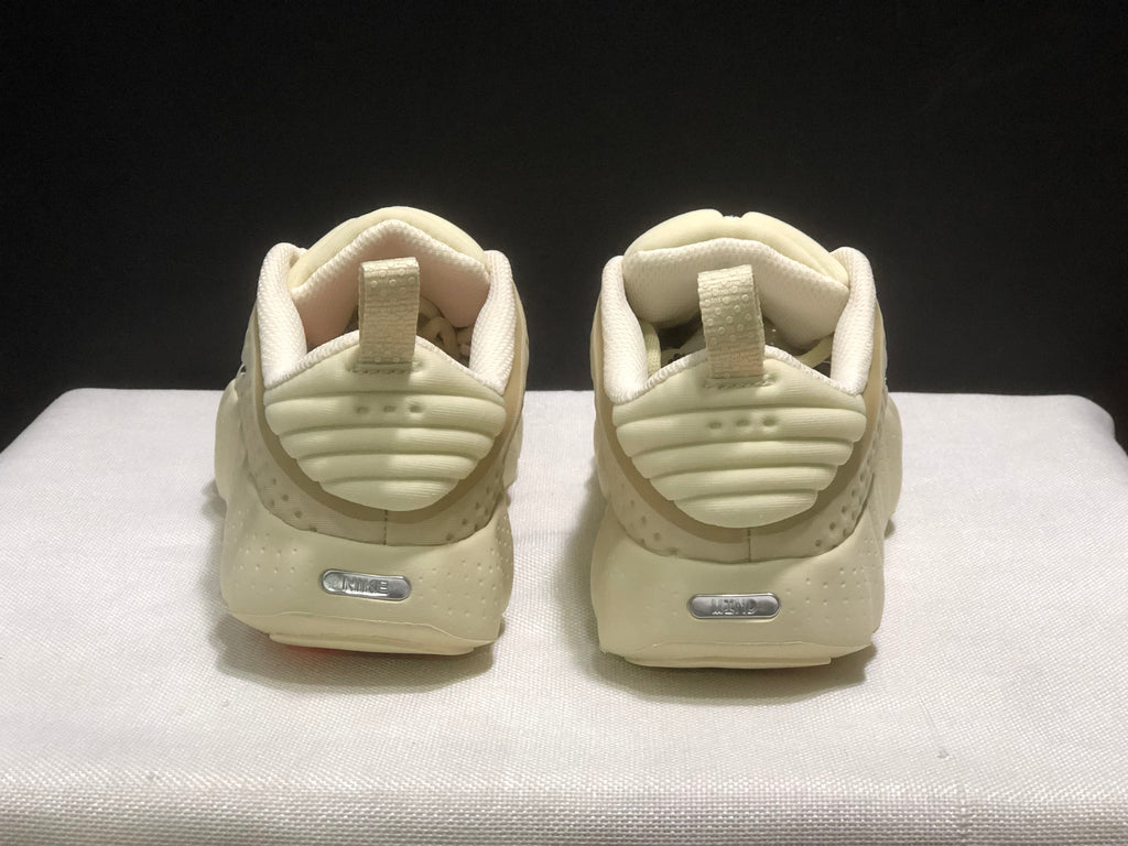 Rear view of the pair showing heel pull tabs, layered heel details, and silver heel branding.