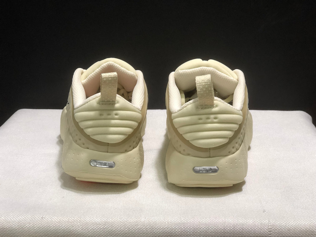 Rear view of the pair showing heel pull tabs, layered heel details, and silver heel branding.