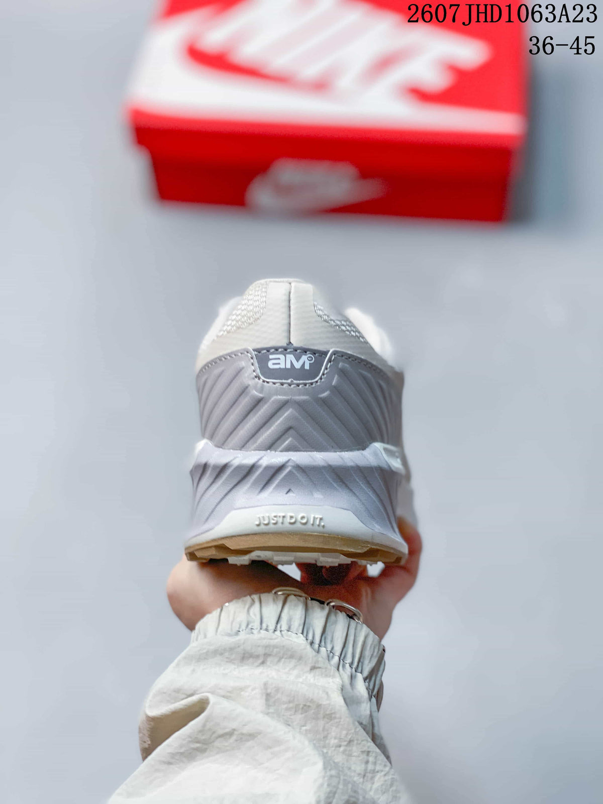 Rear view showing the padded heel, sculpted midsole, and visible branding details.