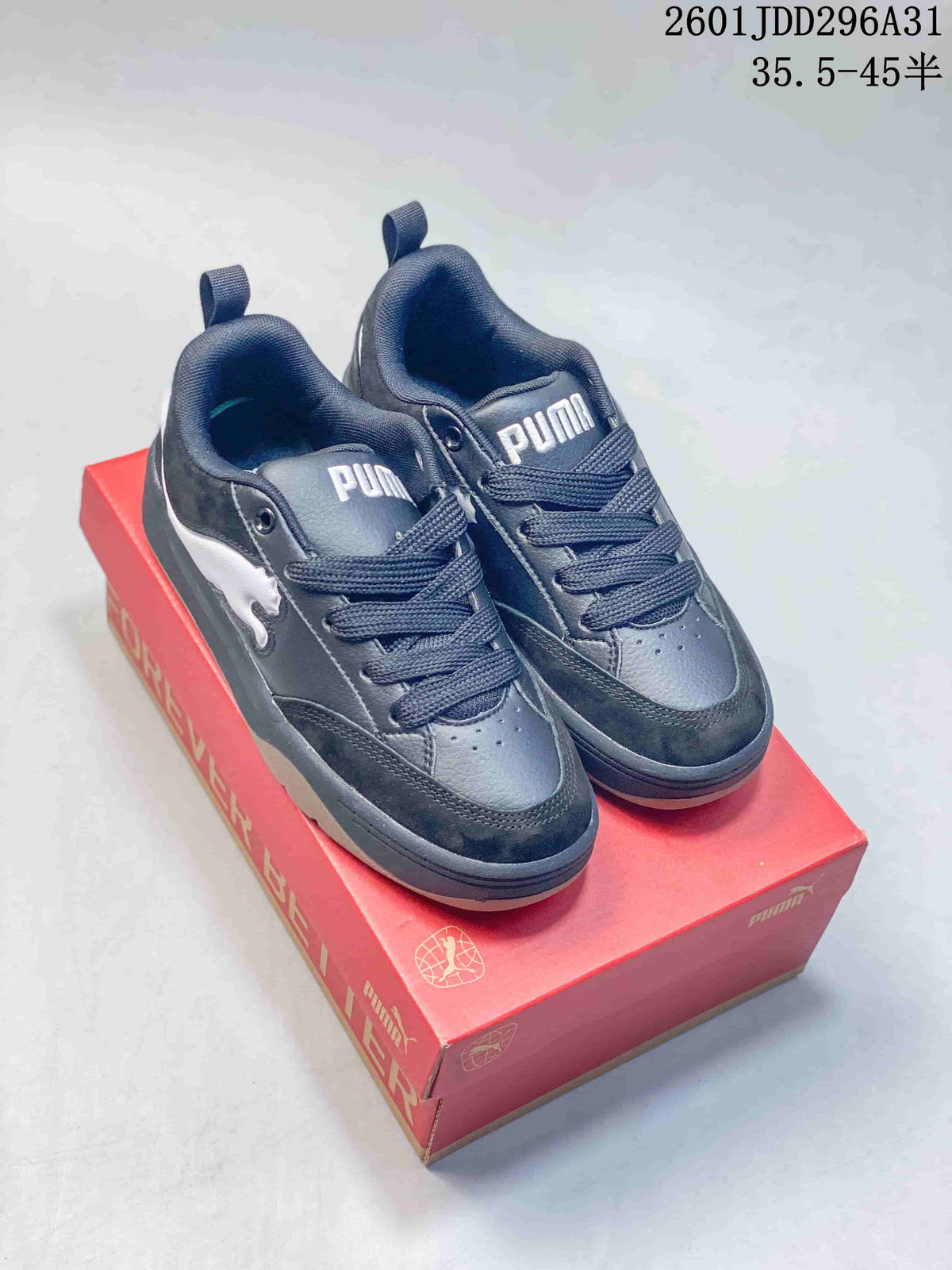 Four PUMA 180 low-top sneakers shown in black, white with navy, light neutral, and white with green colorways.