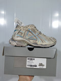 Puma 2240 Runner sneaker in taupe and blue displayed on its product box, with the label showing style 2240 Runner and sample size C 37.