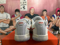 Rear view of white Nike GT Cut 3 basketball shoes with red accents and grey heel panels.