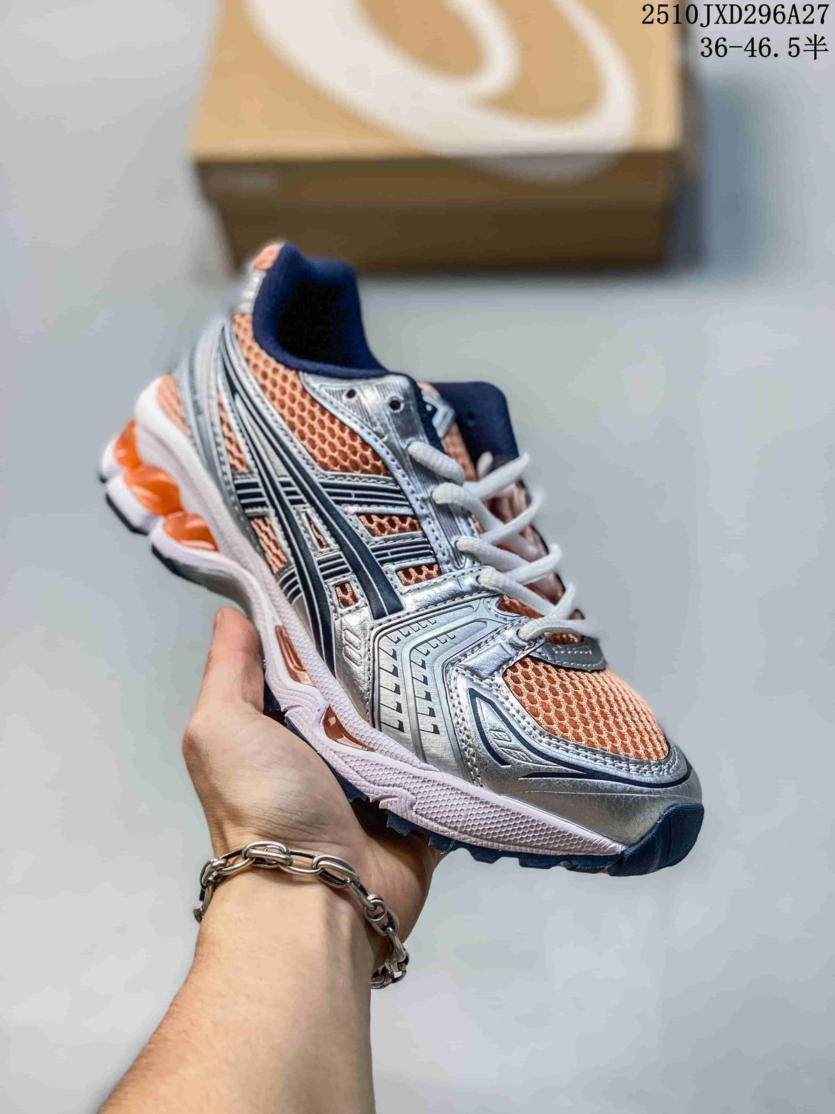Silver sneaker with peach-orange mesh panels and white laces