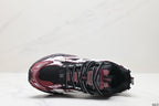 Top-down view showing the black mesh toe box, burgundy overlays, black laces, and padded tongue.