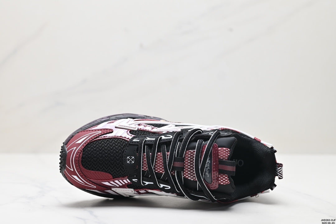 Top-down view showing the black mesh toe box, burgundy overlays, black laces, and padded tongue.