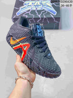Charcoal Nike Ja 3 basketball shoe with orange and blue accents