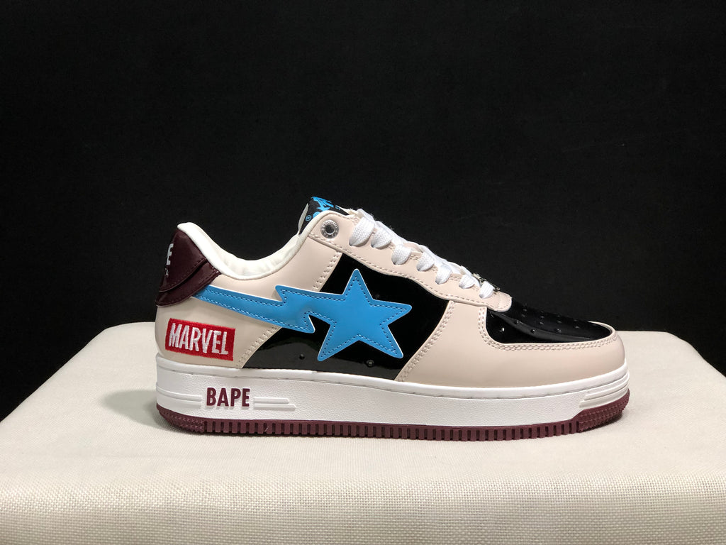 Outer side profile showing the blue star emblem, black panel, cream upper, burgundy heel accent, and MARVEL and BAPE markings.
