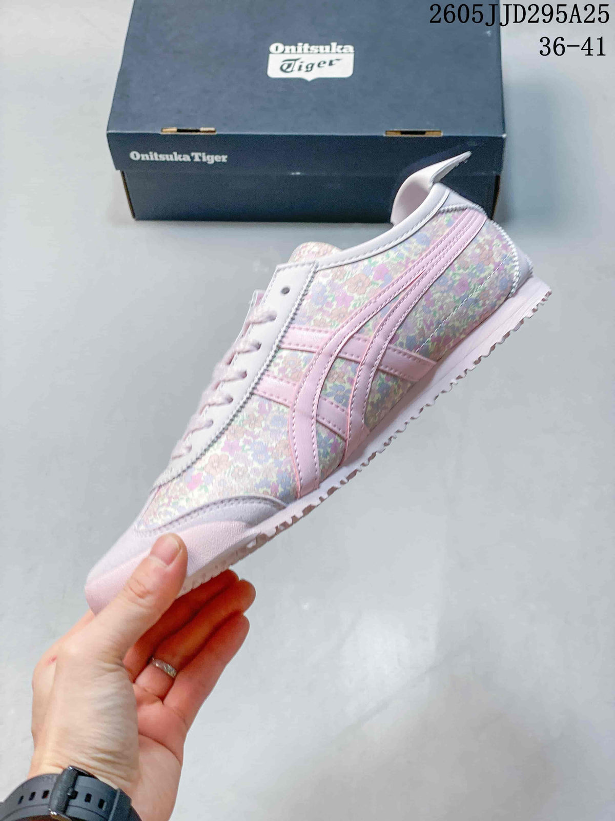 Side profile showing the pastel floral upper, pink stripes, and low-top silhouette.