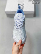 Top view showing the perforated white toe box, laces, and padded tongue.