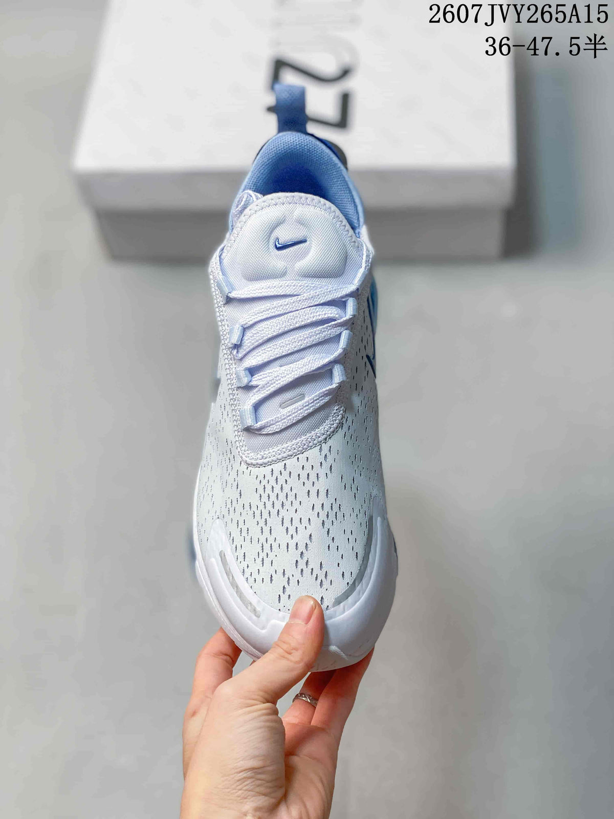 Top view showing the perforated white toe box, laces, and padded tongue.