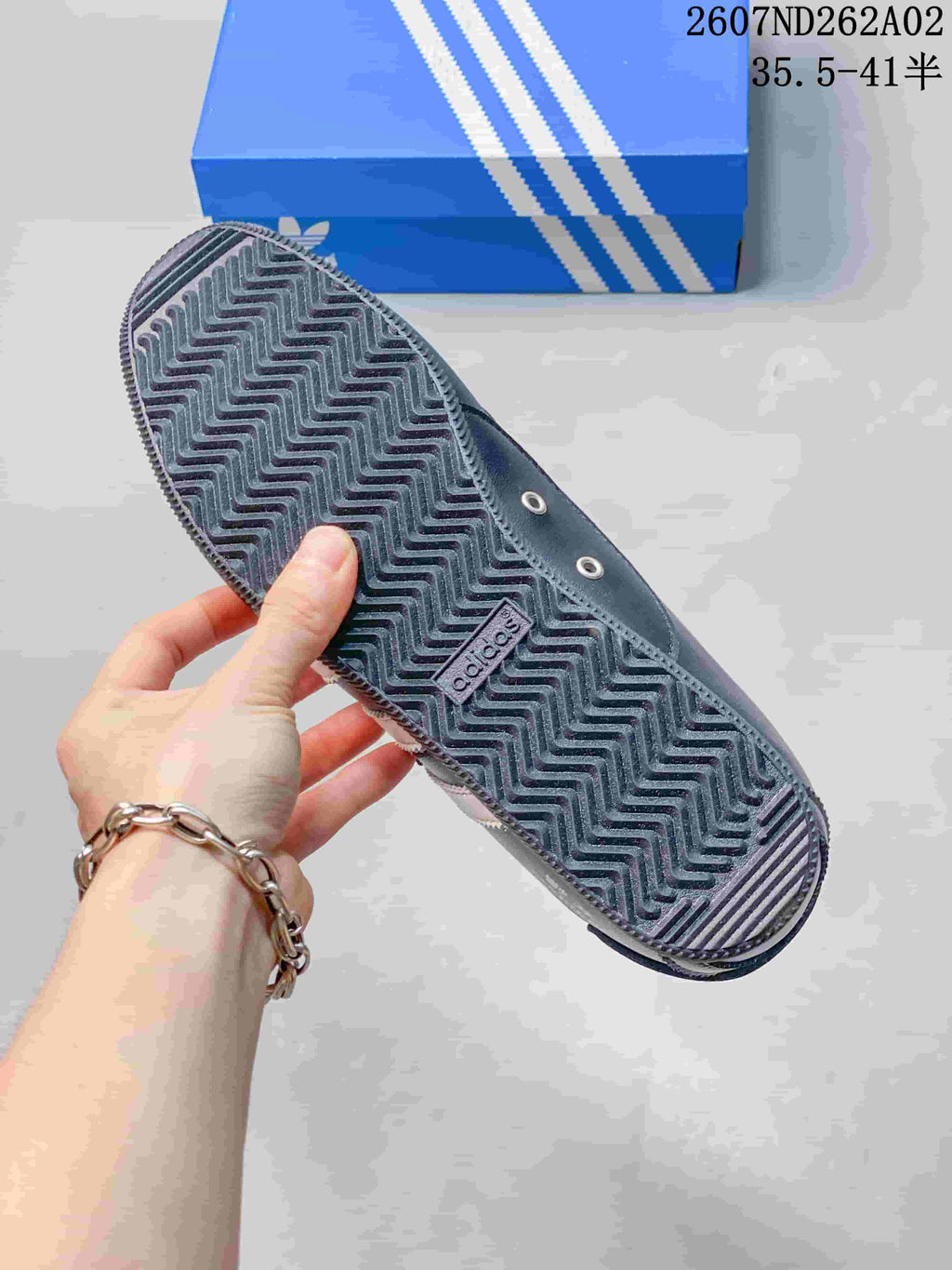 Close-up of the textured outsole on the black adidas Originals ANFU MJ sneaker