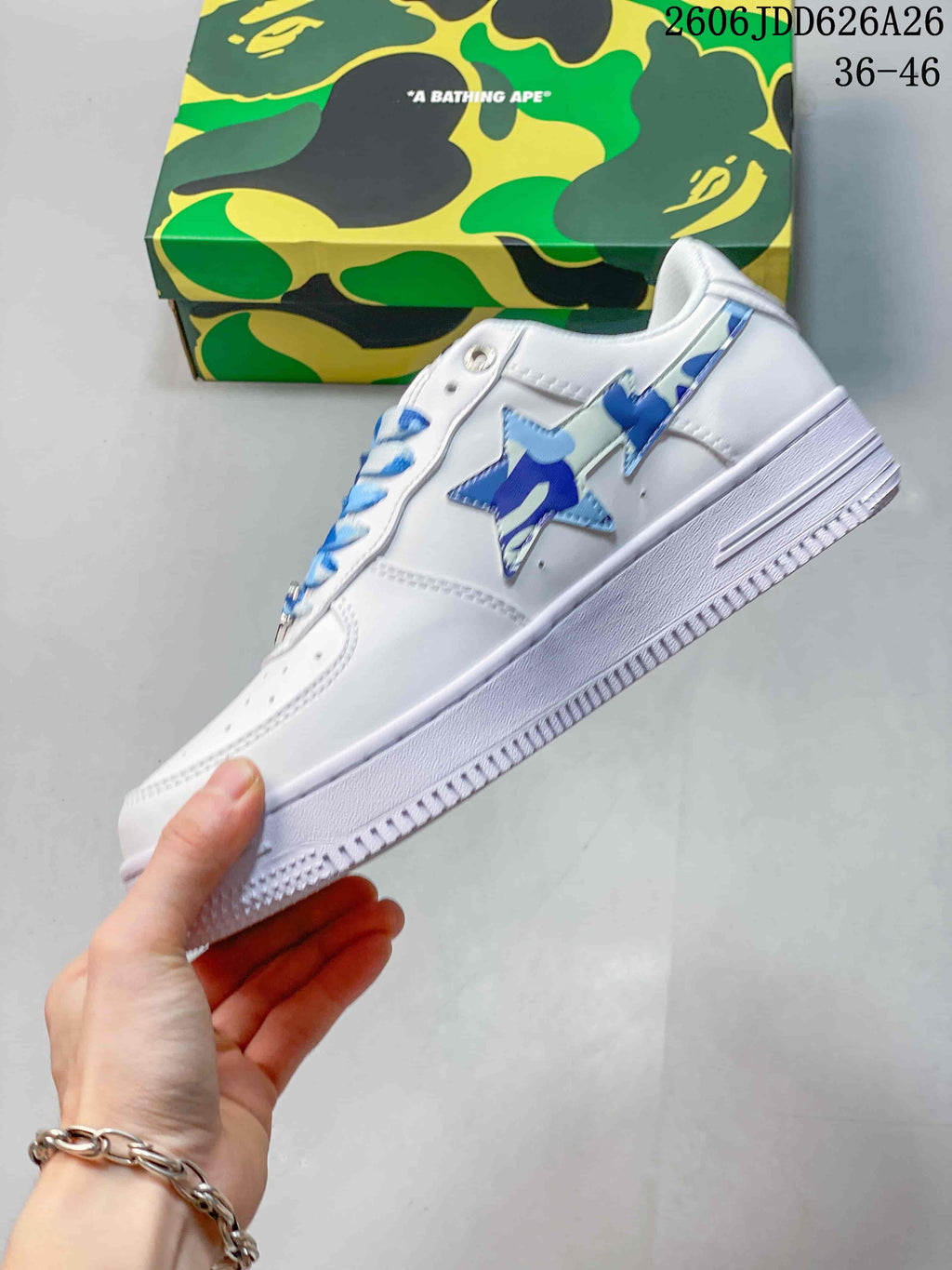 Side profile showing the white low-top construction and layered blue pastel star details.