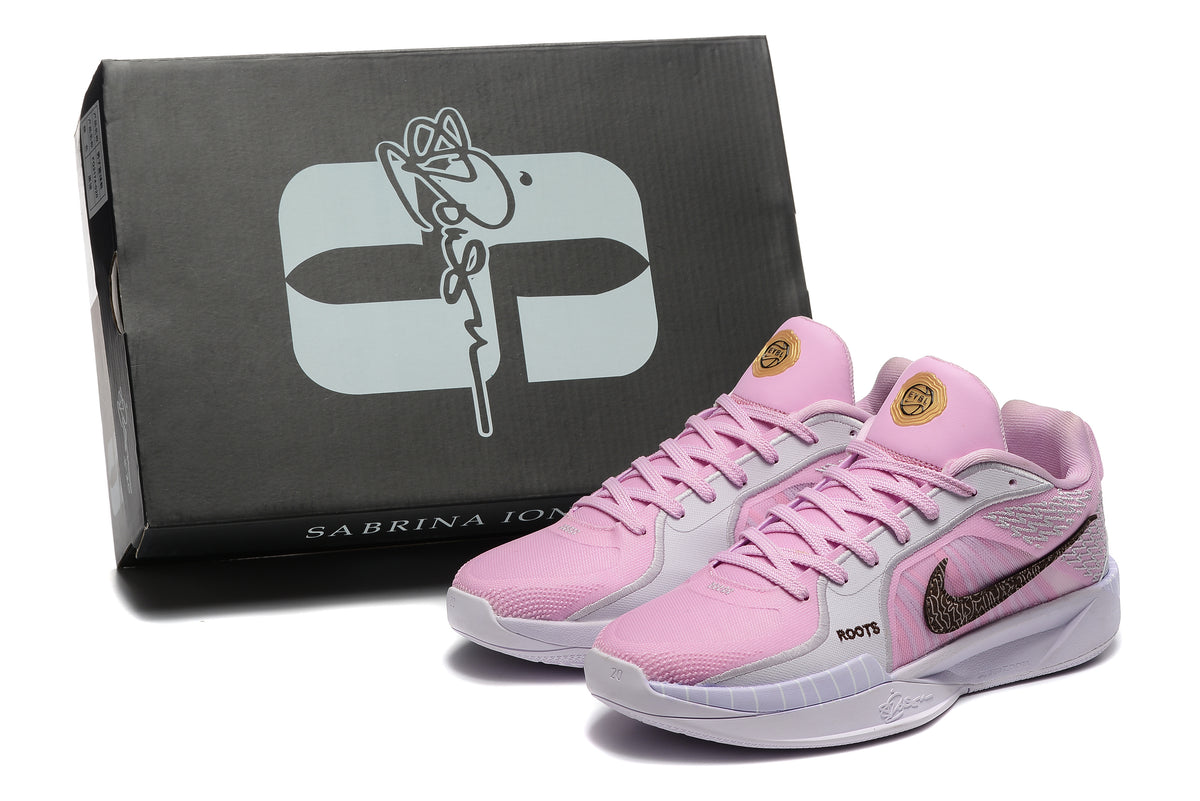 Pink basketball shoes beside a box marked Sabrina 10.