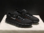 Three-quarter view of the pair highlighting the black perforated uppers and silver-colored side logos.