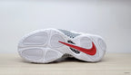 Underside view showing the white outsole and red Nike Swoosh