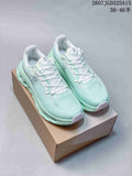 Pair of mint green and white On Cloudtilt sneakers displayed on a cardboard shoe box.