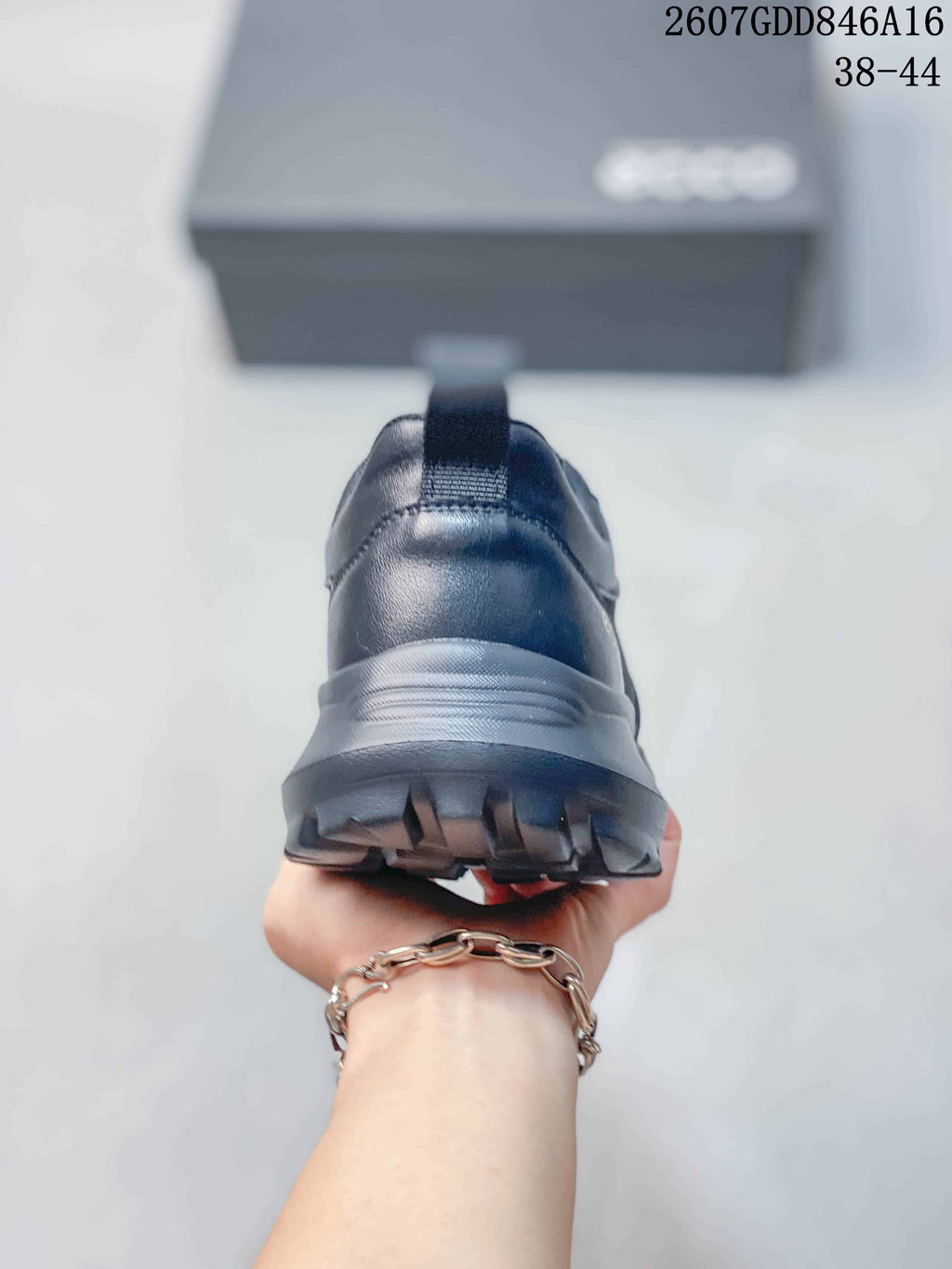 Rear view of the sneaker showing the padded heel, pull tab, layered midsole, and rugged outsole.