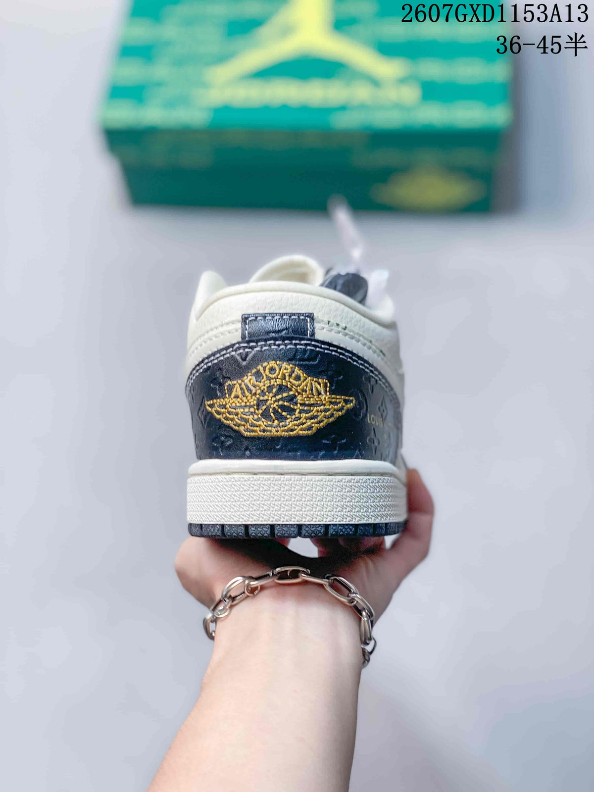 Rear view showing the dark navy heel panel, gold winged basketball emblem, and white midsole.